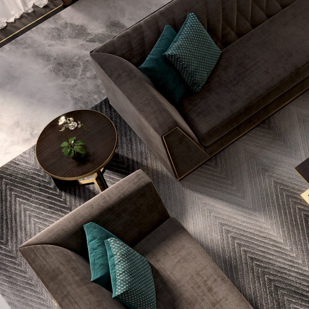 Overhead image of luxury small round three legged accent table with brass detail