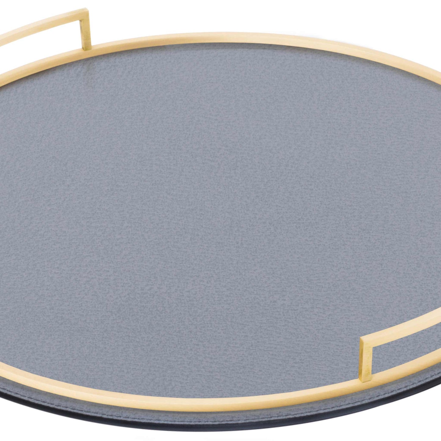 Close up of round storm blue boar textured Italian leather tray with brass handles