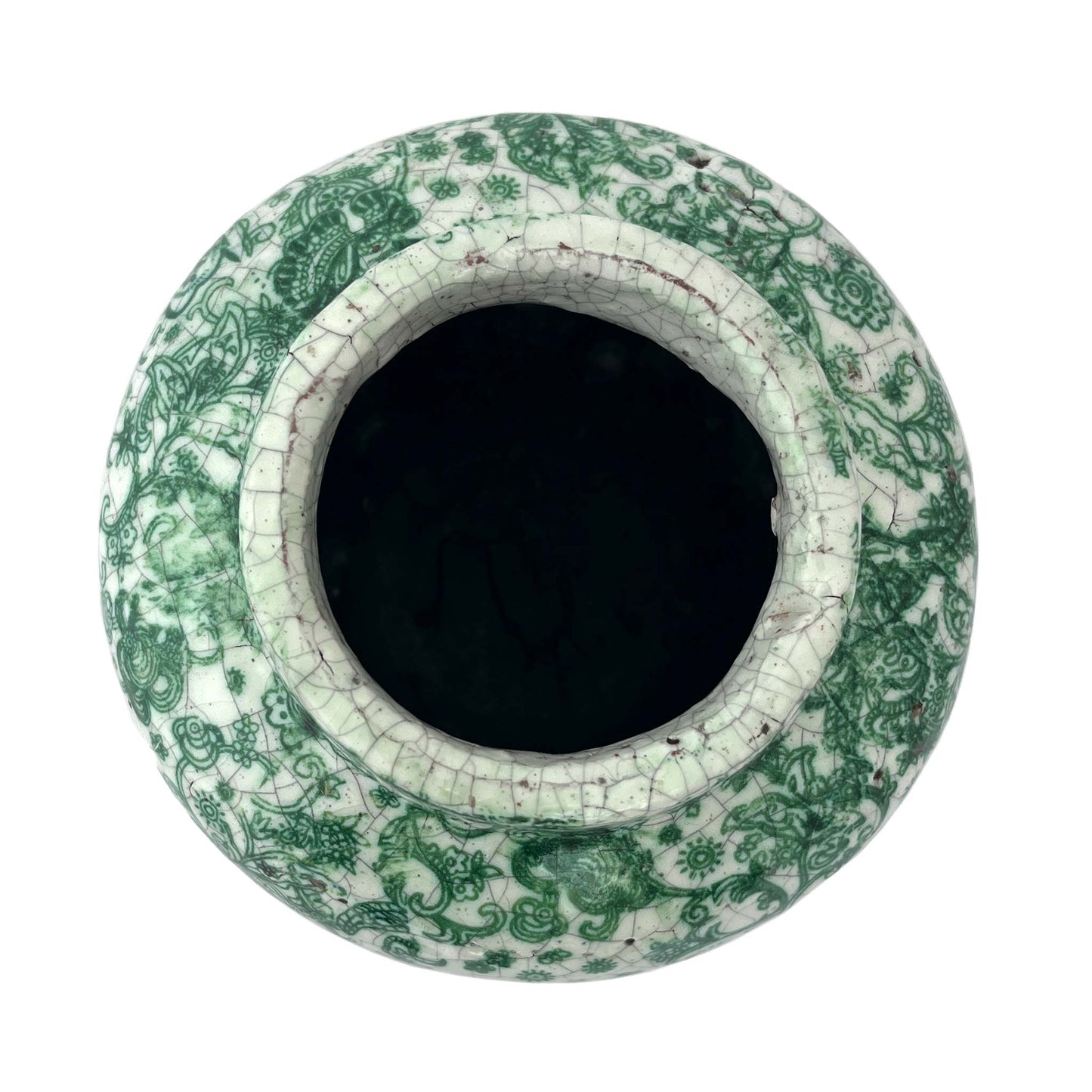 Crackle glazed small planter in white and green seen from above.