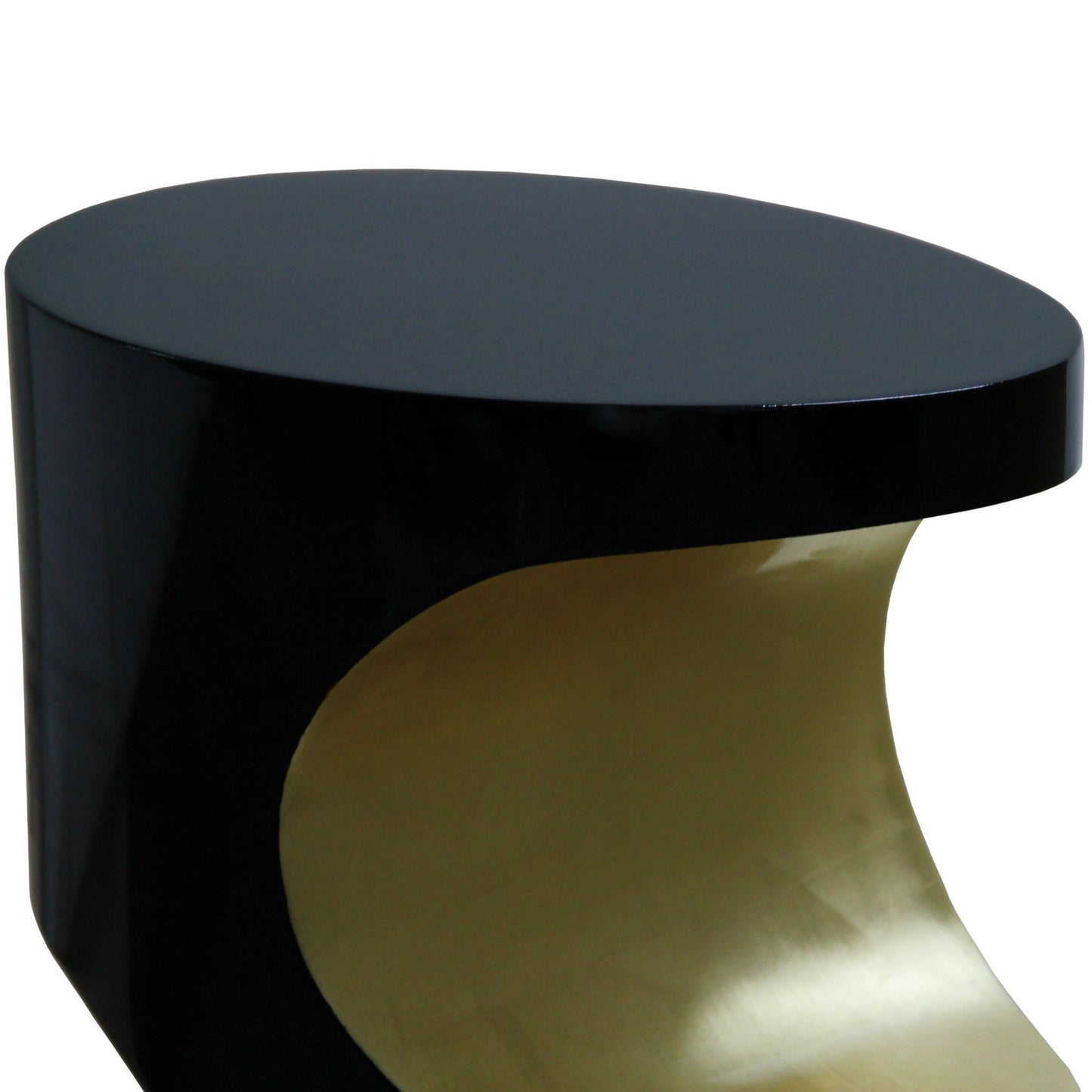 close up shot of the side table showing the black lacquer fibreglass body and gold leaf detailing