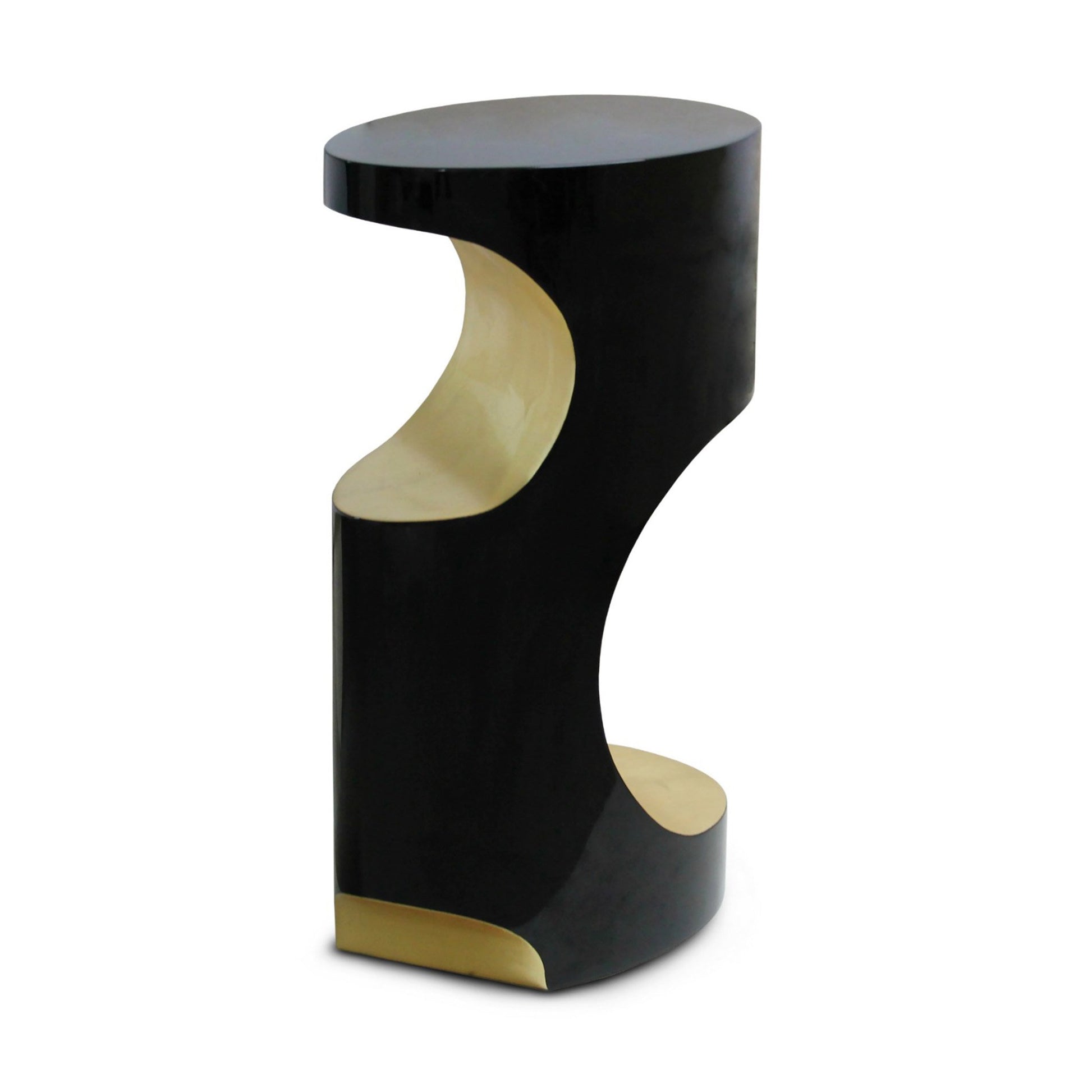 Sophisticated fibreglass body side table finished in high gloss black lacquer and gold leaf