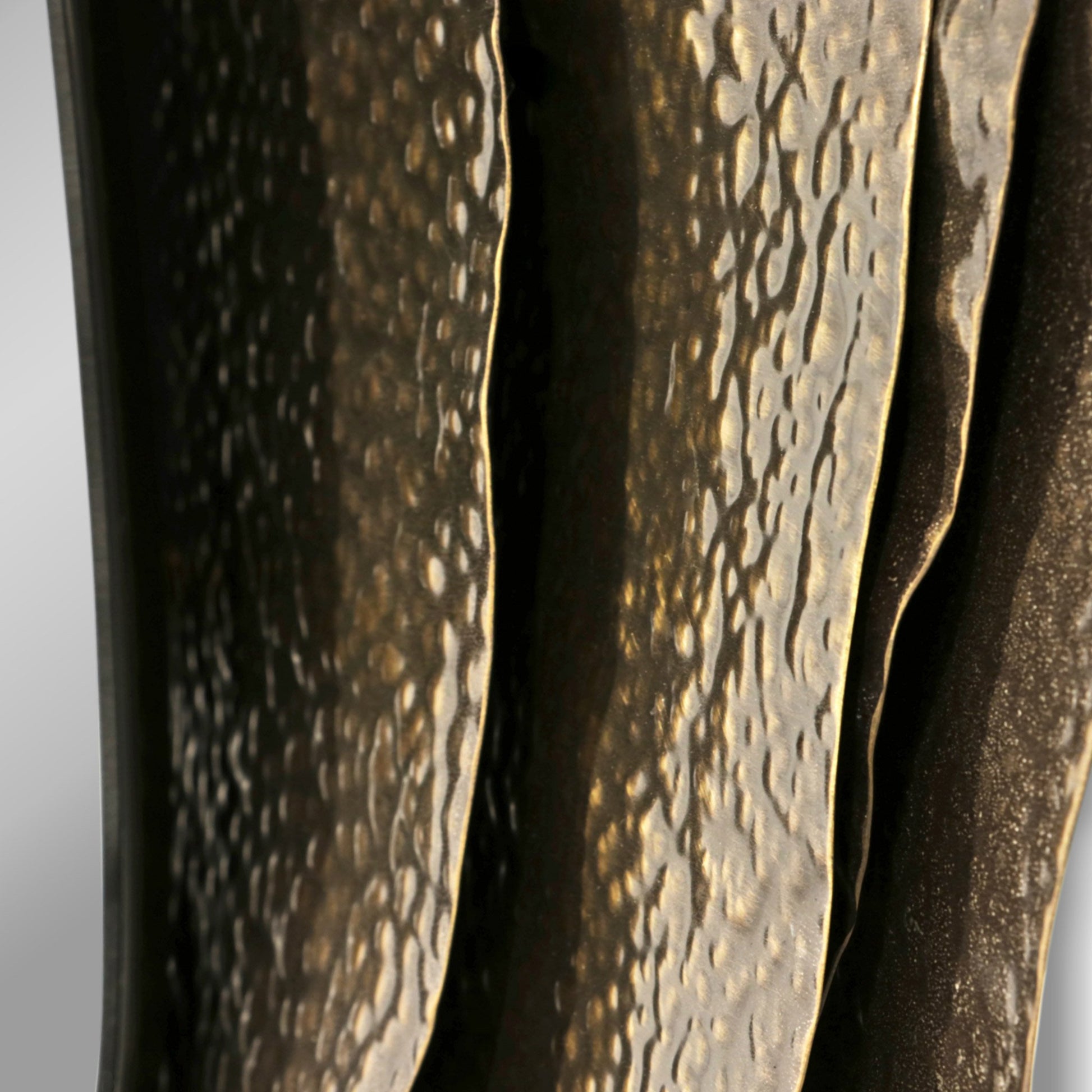 Detail of Dark brass round sculptural mirror