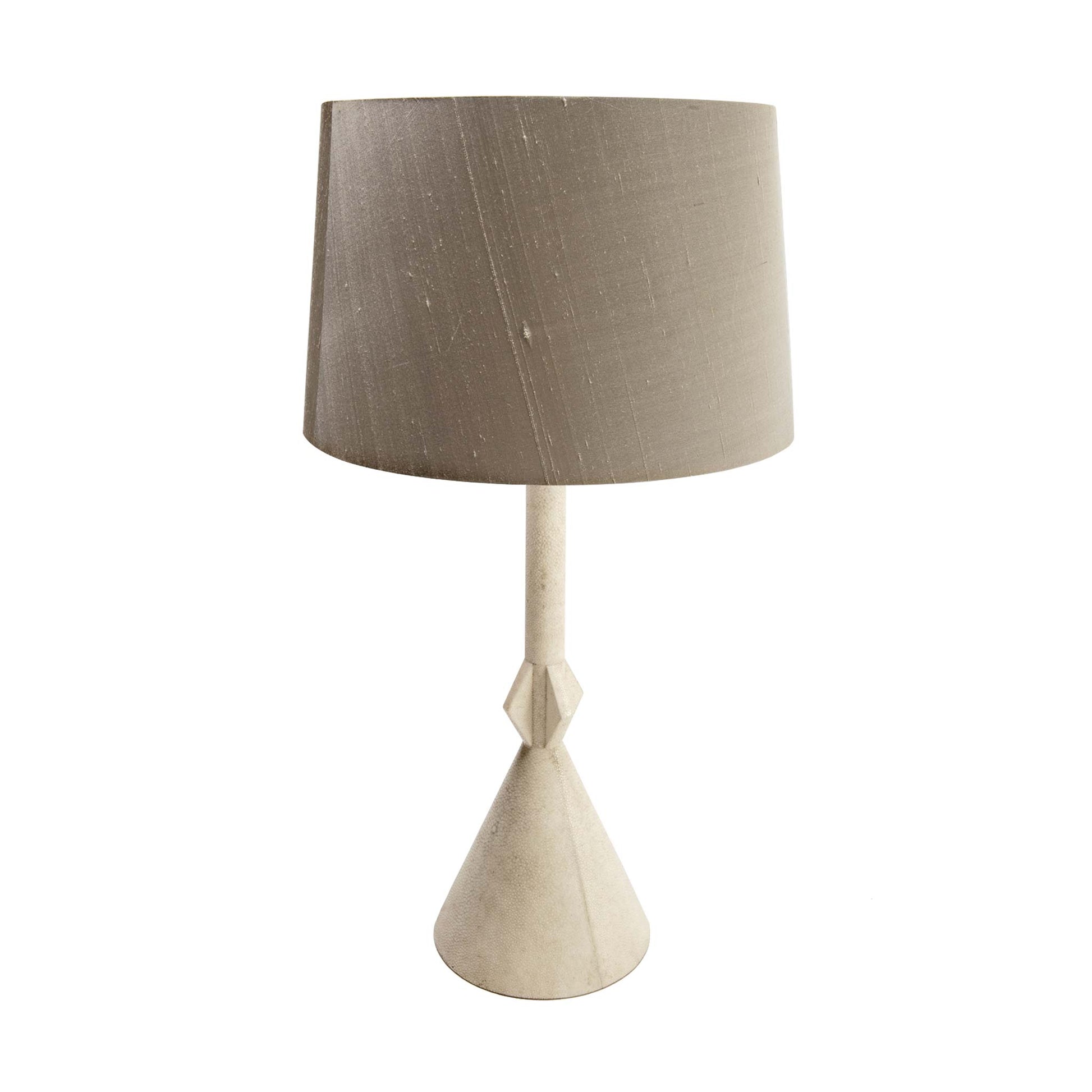 Minimal art deco style pale cream lamp covered in shagreen. Shown with grey silk shade.