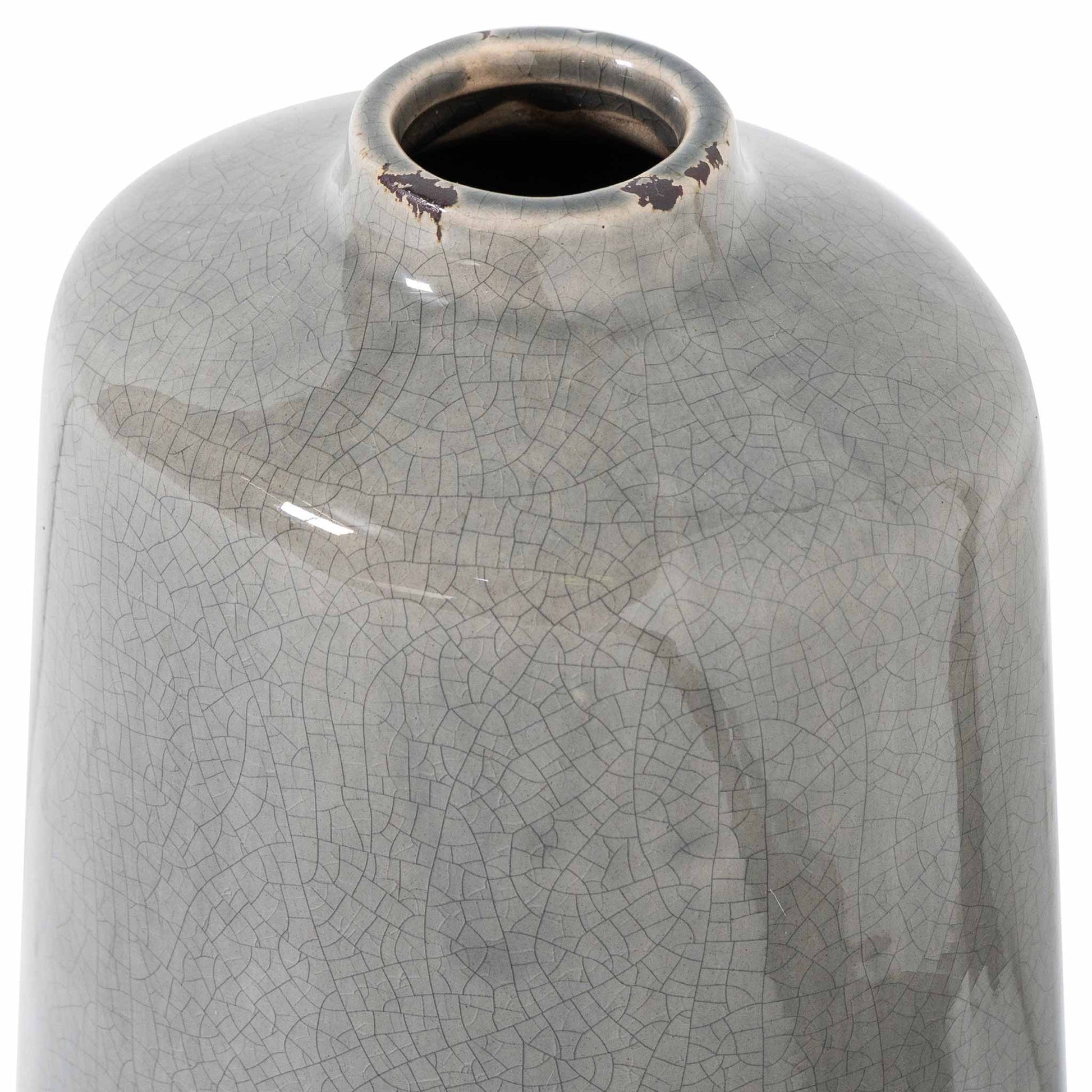 Close up of grey crackle glazed vase, tapered form with small neck.