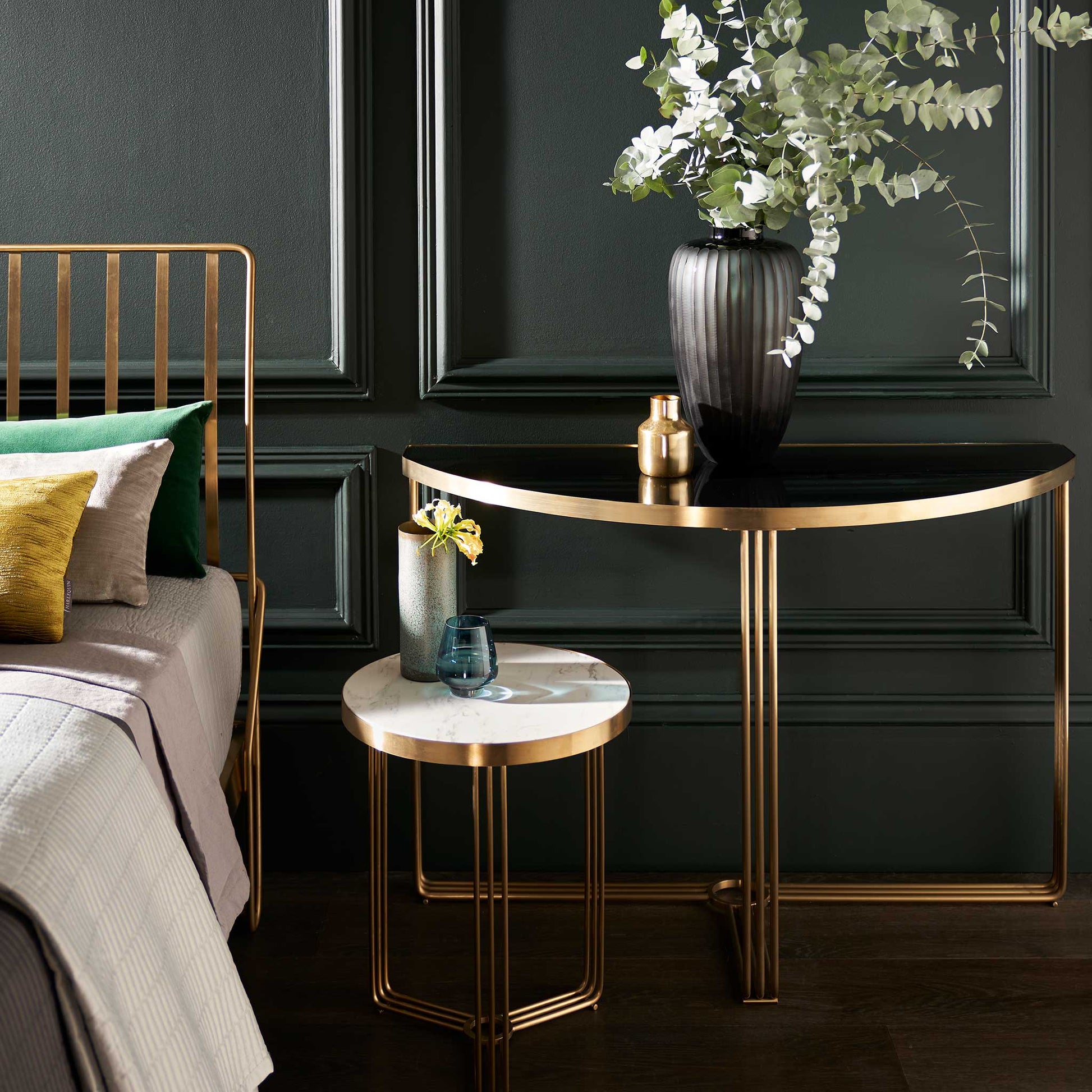 Half moon console table with marble and glass in bedroom