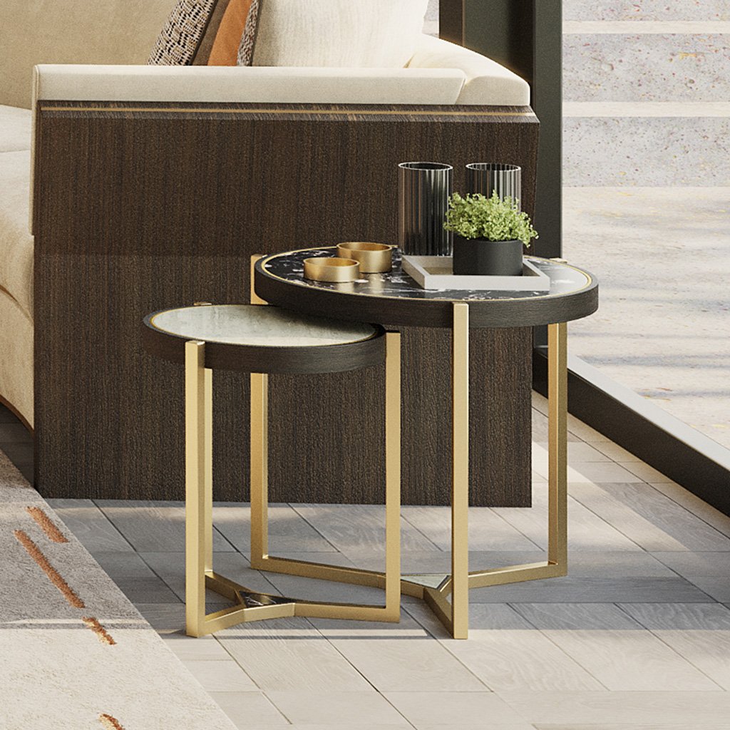 a lifestyle image showing the nesting table set in a living room with decorative pieces placed on top