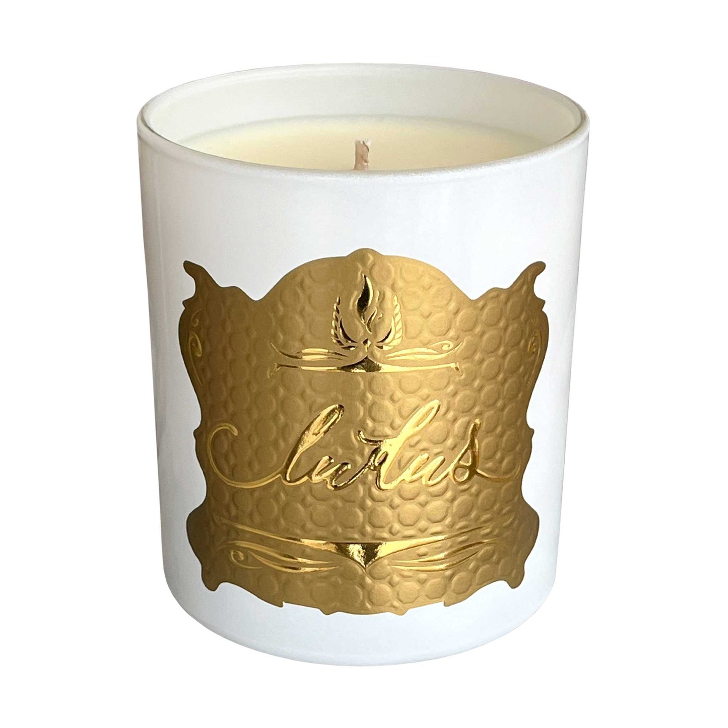 Luxury Island Paradise scented candle. Shown in a white jar with a gold label.