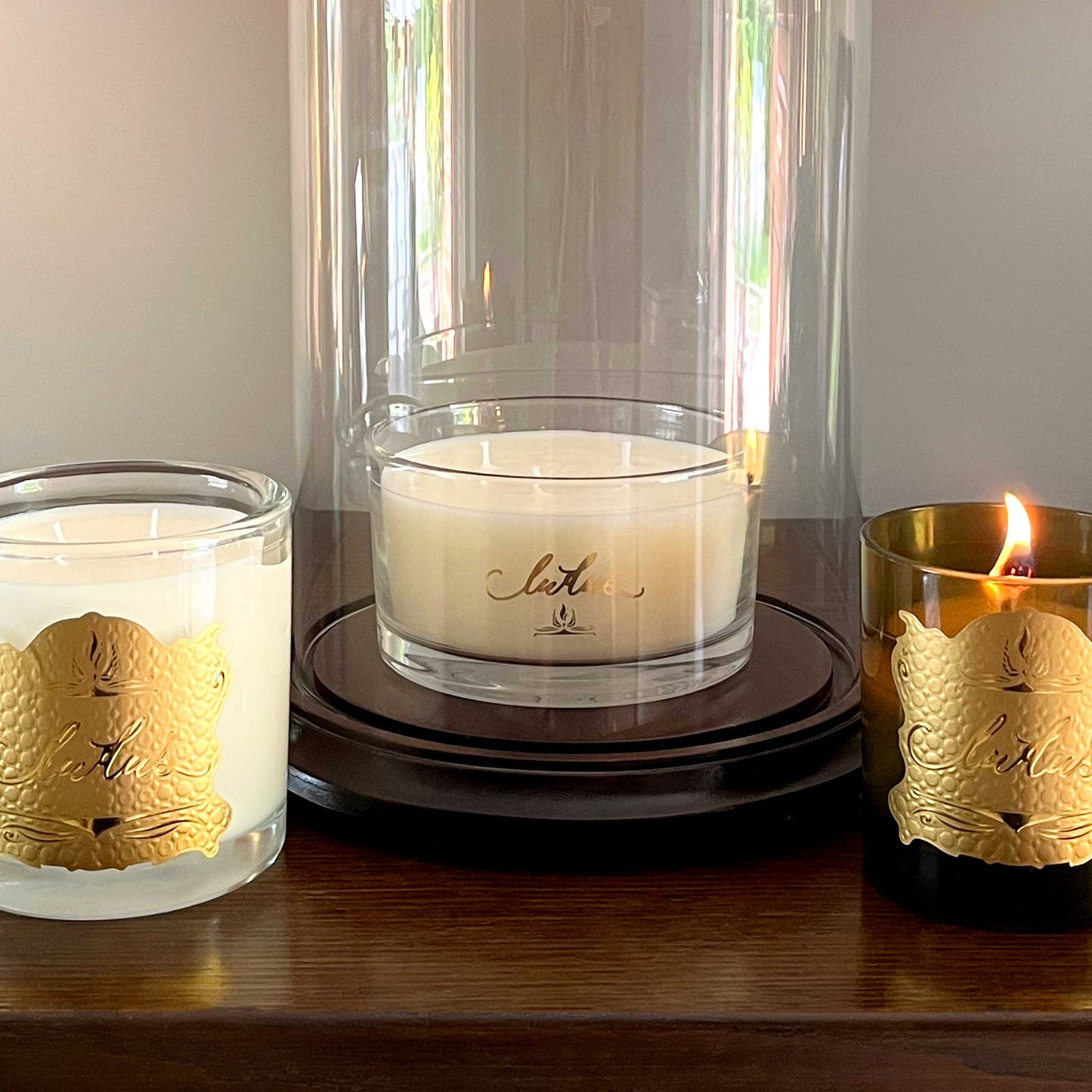 Lifestyle image of a three luxury Ludus candles.