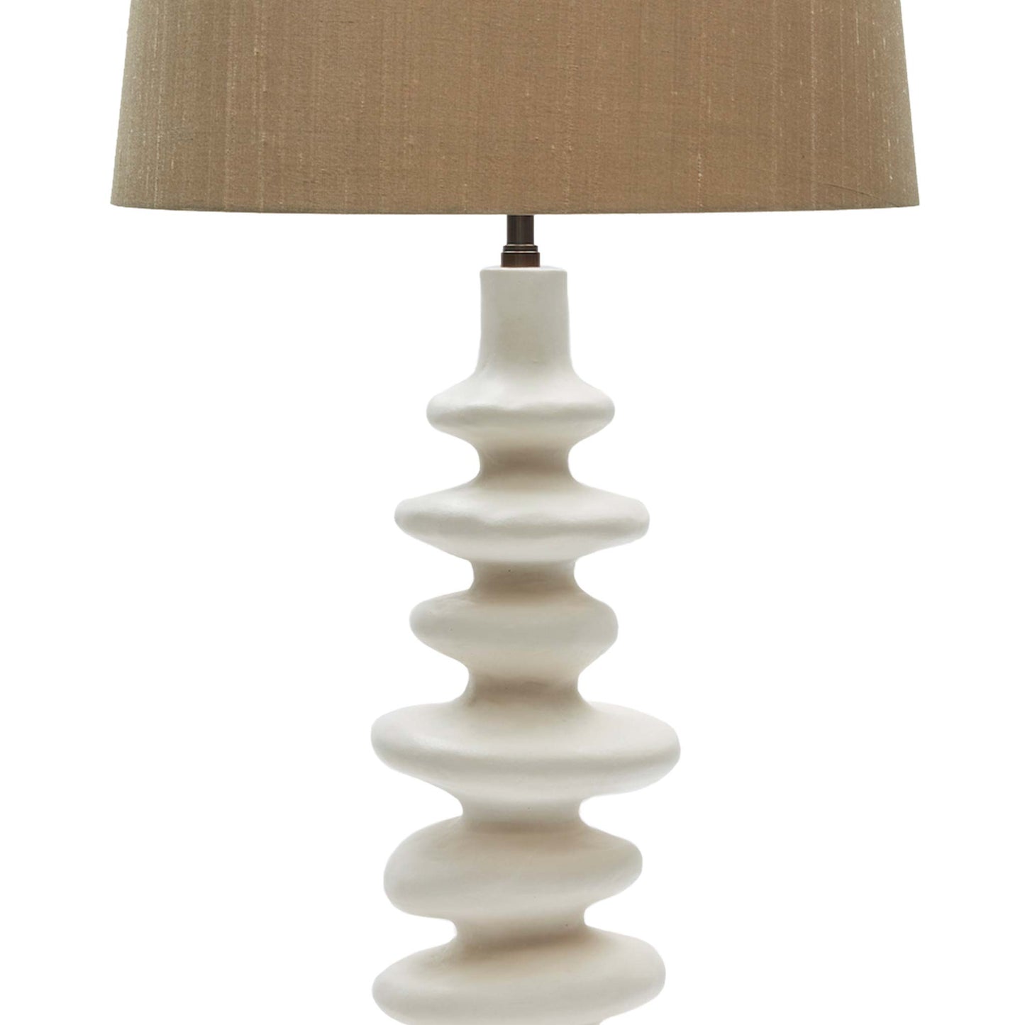 Close up of white jesmonite plaster stacked abstract style lamp base 