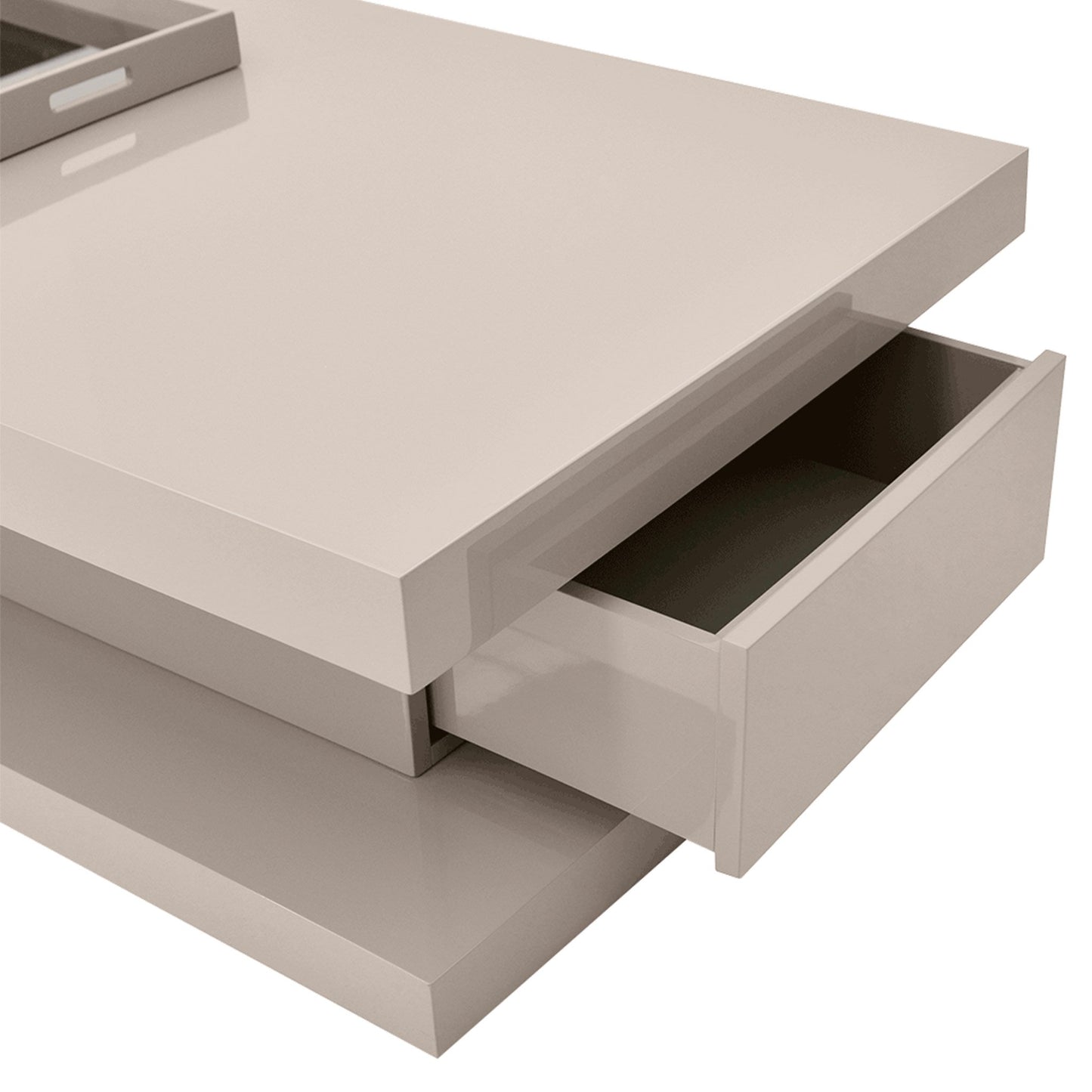 Close up of gloss coated minimal and modern low coffee table with mirror inlay tray. Showing drawer detail