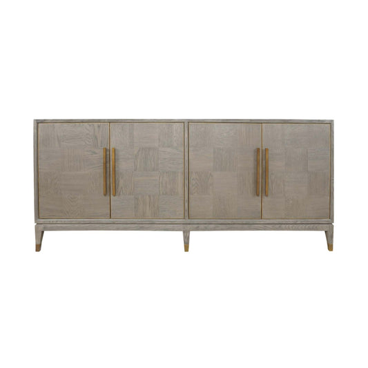 Light oak four door cabinet with long brass handles and brass feet