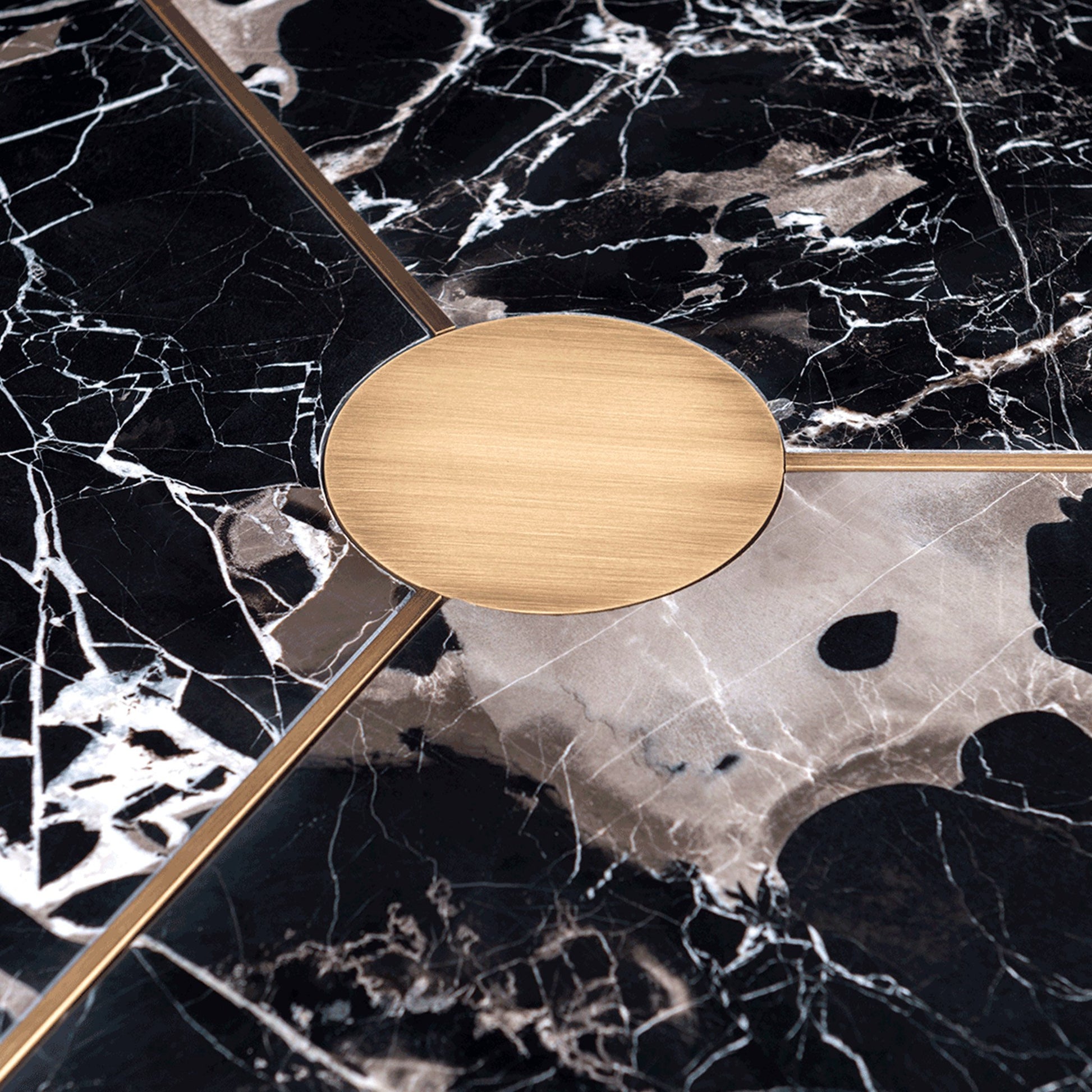 Luxury round marble dining table center with a high gloss lacquered wood tapered base and brushed brass detailing.