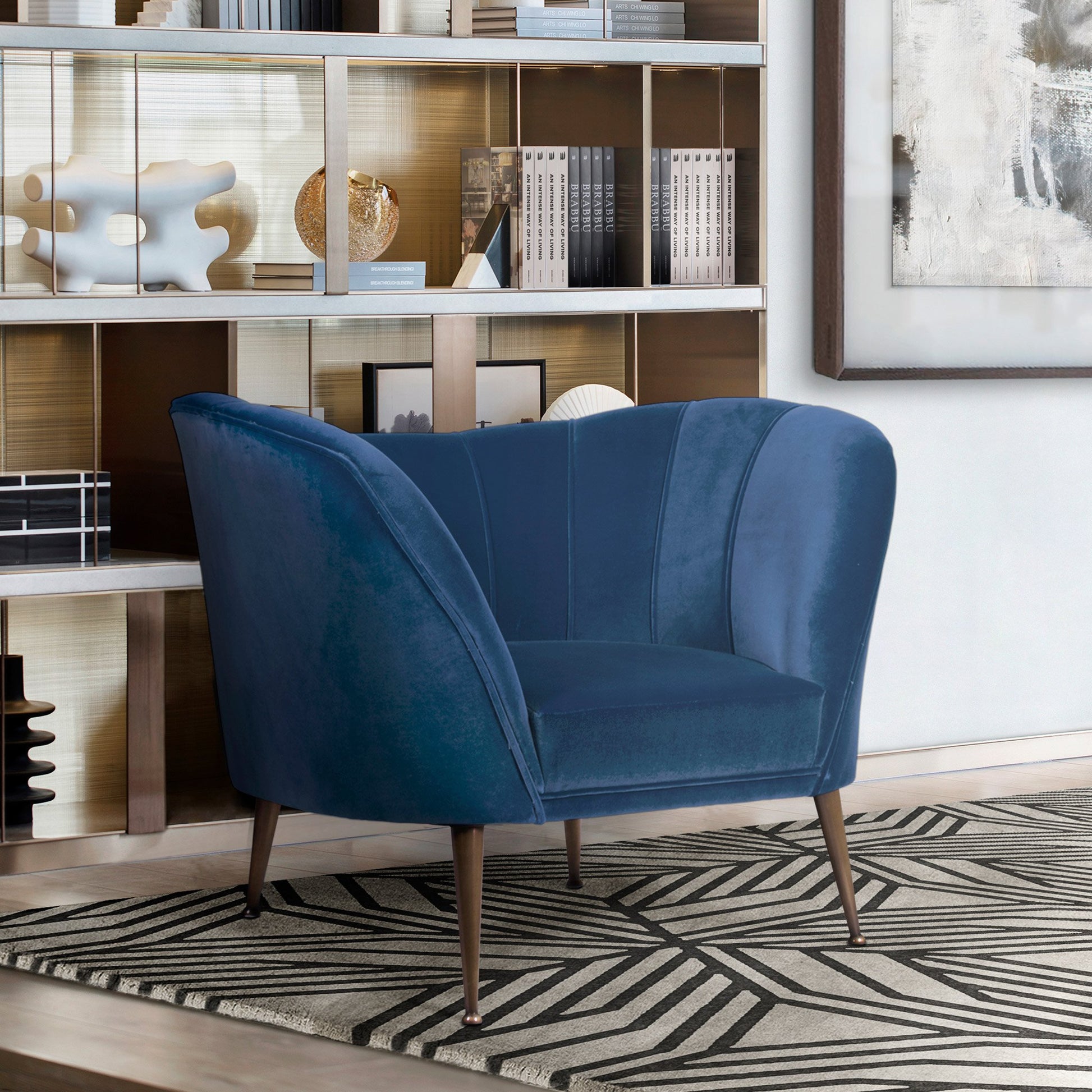 lifestyle shot showing the blue mid-century modern armchair in a luxury and modern office